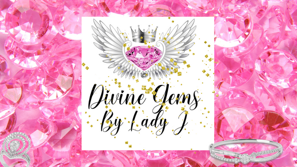 A pink diamond with a crown at the top and wings on each side of the pink diamond to represent divine gems by Lady J. It has gold flakes that also flows over the description and a picture of a diamond ring and bracelet to represent the jewelry being sold.